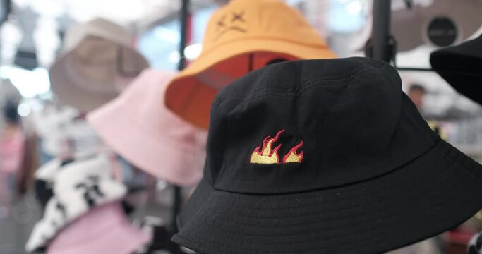 Bucket hats on display on a rack