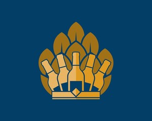 Wine bottle and crown with brewery behind