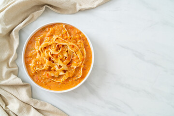 fettuccine pasta with creamy tomato sauce