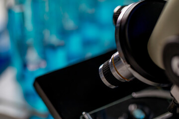 High technology scientific microscope with selective lens objectives for efficient magnification to observe or diagnose microorganisms or pathogenic bacteria in biology research or chemistry lab