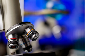 High technology scientific microscope with selective lens objectives for efficient magnification to observe or diagnose microorganisms or pathogenic bacteria in biology research or chemistry lab