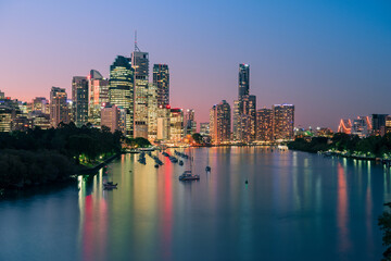 Brisbane city buildings and river seen at sunset from Kangaroo Point. Brisbane is the state capital of Queensland, Australia.