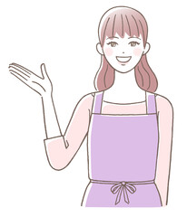 エプロン姿で説明する若い女性