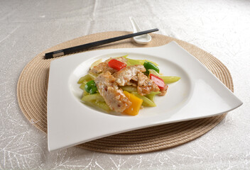 stir fried celery vegetable with fish meat paste in chef special sauce in white background asian halal vegan menu