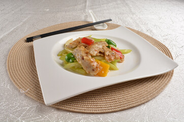 stir fried celery vegetable with fish meat paste in chef special sauce in white background asian halal vegan menu