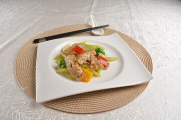 stir fried celery vegetable with fish meat paste in chef special sauce in white background asian halal vegan menu