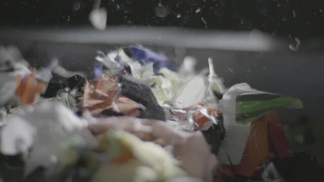 Old Fabric Falling During Production Of Recycled Textiles At A Recycling Plant