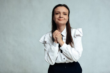 young woman with a smile looking up