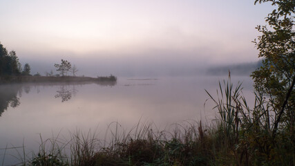 Foggy early morning on the autumn river