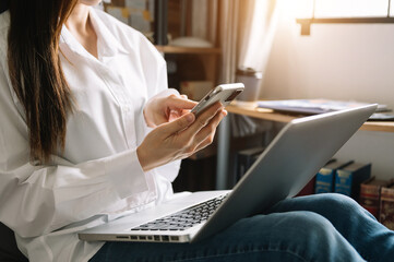 hand using tablet ,laptop, and holding mobile with credit card online banking payment shopping.