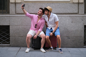 Tourist couple taking a selfie.