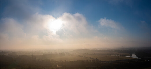 Fototapeta na wymiar The Ruhr meadows in Duisburg Meiderich in morning fog