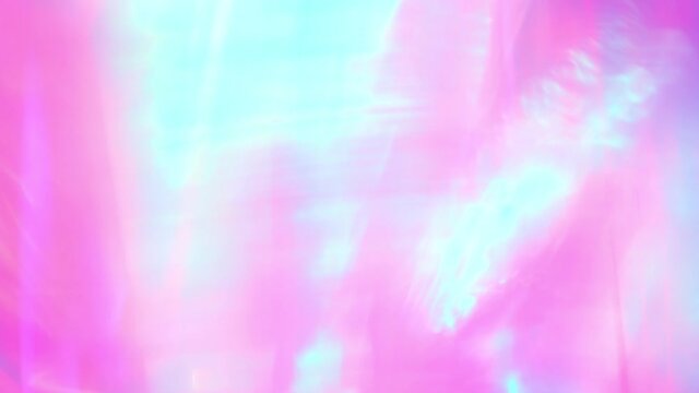 Pastel unicorn purple blue pink teal colors abstract festive background. Optical refraction of light through a prism, bokeh glow glow shine flare