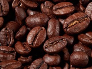 Roasted coffee beans background macro