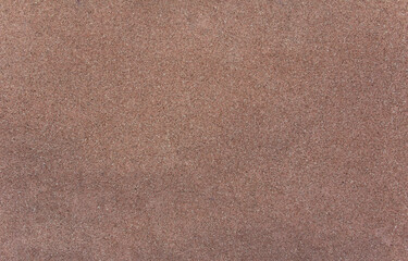 Small dark pink granite texture. Background.