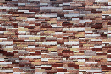 Brick wall of different textures, shapes and colors. Background.