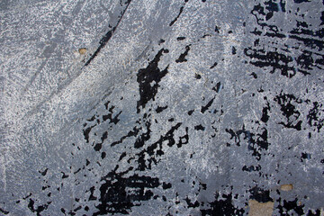 Chipped gray and black paint urban texture. Background.