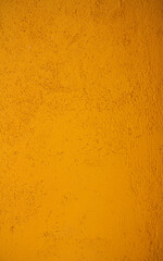 Wall texture with orange paint. Background.