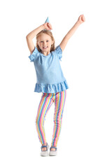 Cute little girl in party hat on white background