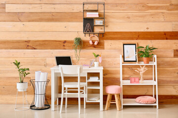 Interior of stylish room with modern workplace