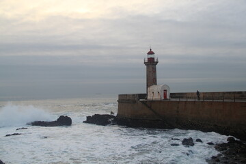 Fototapeta premium lighthouse on the shore of the sea