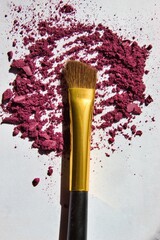 make up brush and powder