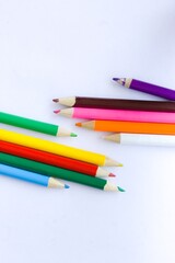 color pencils on a white background
