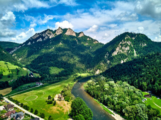 Beautiful aerial panoramic view of the Pieniny National Park, Poland in sunny day from Sokolica and Trzy Korony - English: Three Crowns (the summit of the Three Crowns Massif) on on the Dunajec river