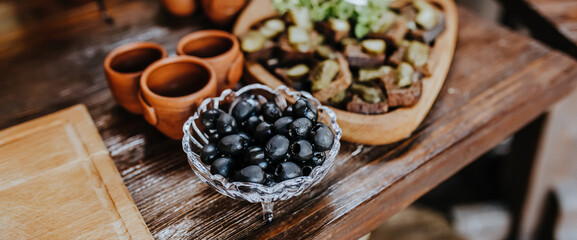 Beautifully decorated snacks on the banquet table before the holiday. Catering food and drink on wedding party