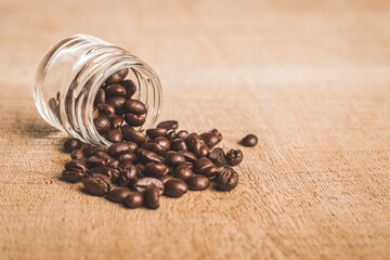 Coffee beans with textured background stock image.