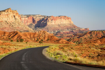 A highway cuts through Capitol Reef National Park, Utah