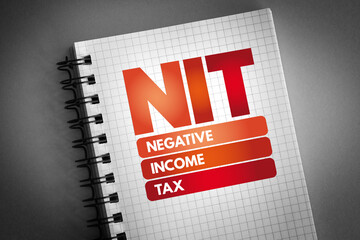 NIT - Negative Income Tax acronym on notepad, business concept background