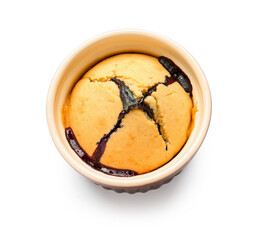 Ramekin with blueberry cobbler on white background
