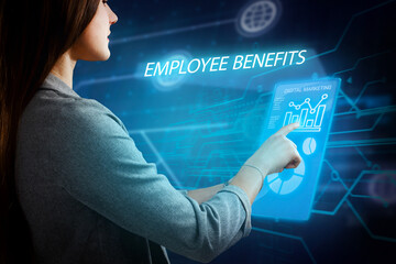 Business, Technology, Internet and network concept. Young businessman working on a virtual screen of the future and sees the inscription: Employee benefits