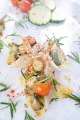 Vegan pasta shell cooking with tofu sauce and zucchini in olive oil