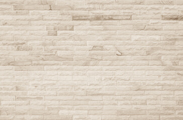 Empty background of wide cream brick wall texture. Beige old brown brick wall concrete or stone textured, limestone abstract decor design backdrop.