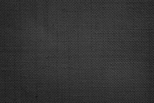 Jute hessian sackcloth canvas woven texture pattern background in light black color blank empty.
