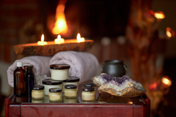 Naturally developed massage therapy and body care products in a rustic wooden environment; essential oils, body butter, candles and aromatic ingredients