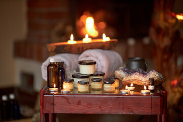 Naturally developed massage therapy and body care products in a rustic wooden environment; essential oils, body butter, candles and aromatic ingredients