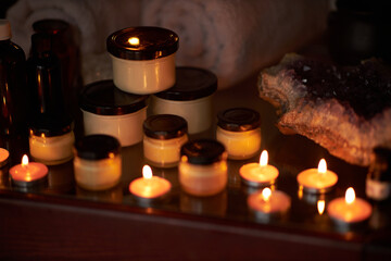 Naturally developed massage therapy and body care products in a rustic wooden environment; essential oils, body butter, candles and aromatic ingredients