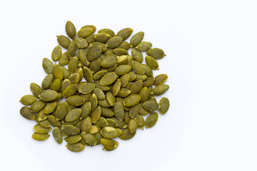 Pumpkin seeds on white background