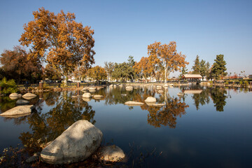 Afternoon autumn view of a public park in downtown Bakersfield, California, USA. - obrazy, fototapety, plakaty