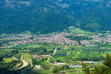 Fototapeta na wymiar Aerial view of the small town of Levico Terme, tourist resort on the coast of Levico Lake, Valsugana (Sugana Valley), Trento province, Trentino Alto Adige, Italy, Europe.