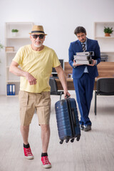 Fototapeta na wymiar Old boss and young male employee in summer vacation concept