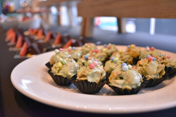 Merry Christmas happy season party buffet night with pastry log cake sweet desserts, bbq roast turkey, honey ham, bulgogi beef, pie, canapés, butler, drinks and fruits in 5 star hotel 