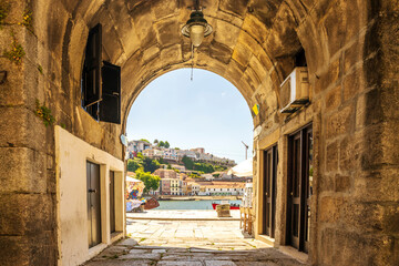 Historic gate to medieval city of Porto with view on Vila Nova de Gaia, Portugal