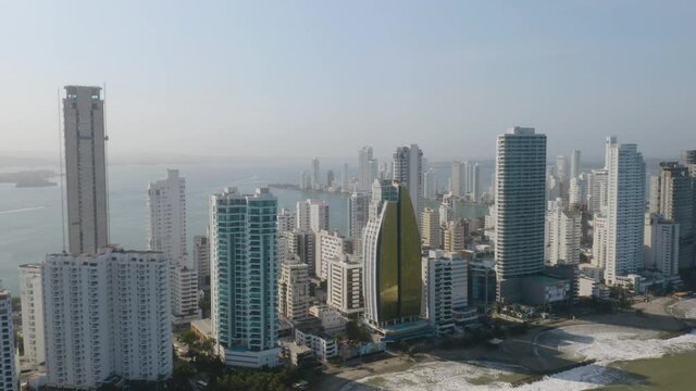 Aerial Establishing Shot of Skyscrapers in Cartagena's Modern Neighborhood. Home to Wealthy Individuals, Digital Nomads, and Tourists