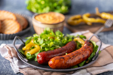 Grilled spicy sausages