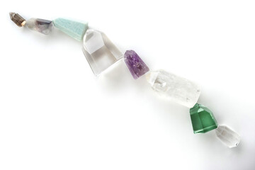 Set of beautiful minerals and crystal stones in a row isolated on a white background