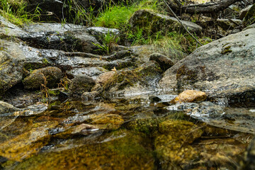 Naklejka na ściany i meble water river with rocks